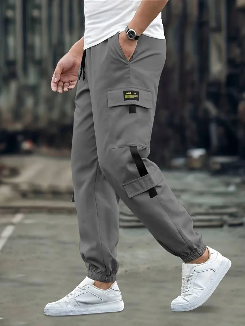 Herrbyxa - Jogger Cargo - Avslappnad Passform - Elastisk Midja och Manschetter - Flera Fickor