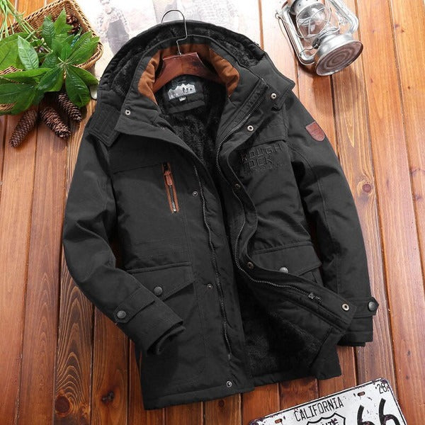 Herrjacka – Oversized passform – Vadderat fleecefoder – Huva – Kviltade axlar – Flera fickor