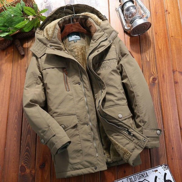 Herrjacka – Oversized passform – Vadderat fleecefoder – Huva – Kviltade axlar – Flera fickor