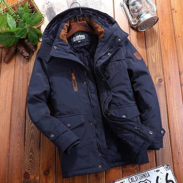 Herrjacka – Oversized passform – Vadderat fleecefoder – Huva – Kviltade axlar – Flera fickor