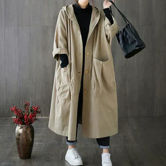 Damtrenchcoat – Oversized passform – Huva – Full längd – Knäppning – Bomullskänsla