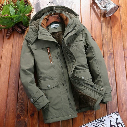 Herrjacka – Oversized passform – Vadderat fleecefoder – Huva – Kviltade axlar – Flera fickor